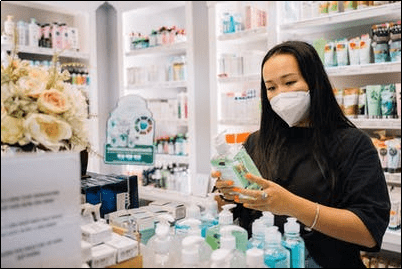 A PCO driver buying hand sanitiser