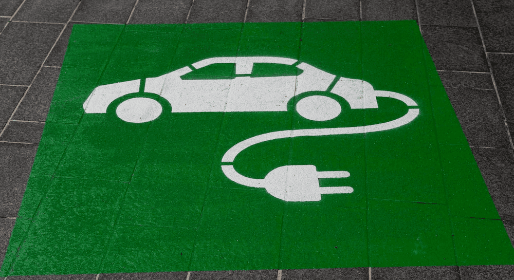 Green sign for EV charging