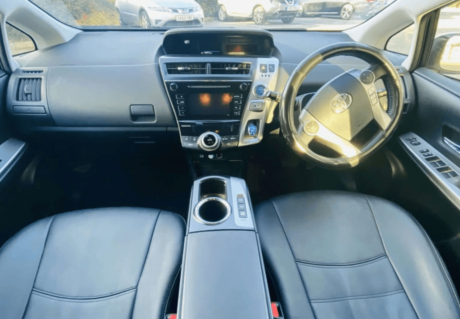 Interior of a PCO car for rent 