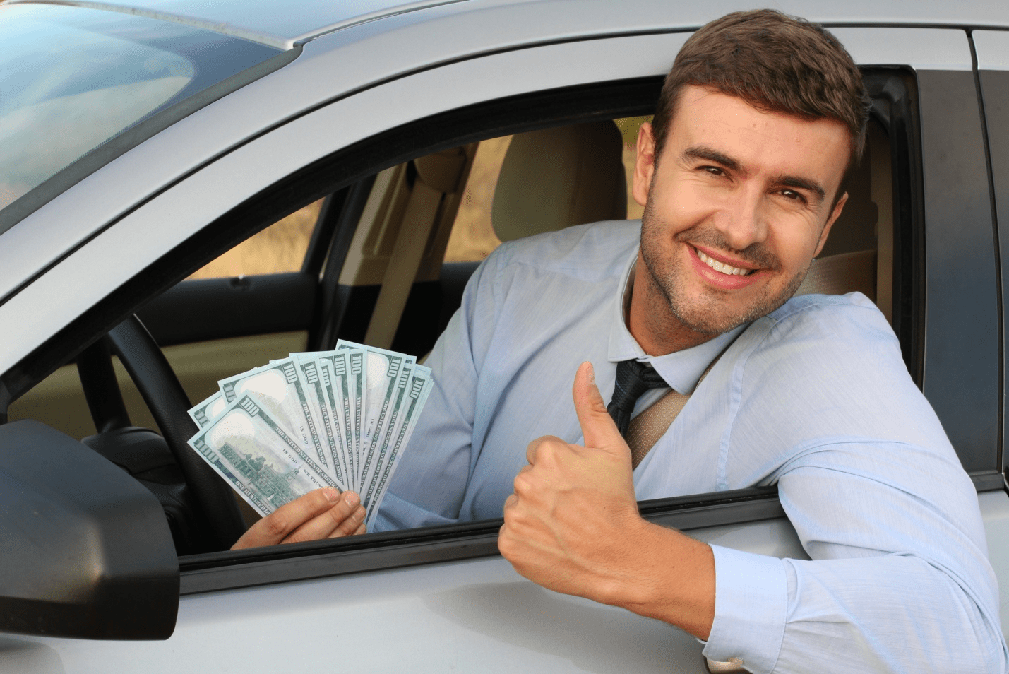 a PCO driver holding a lot of money