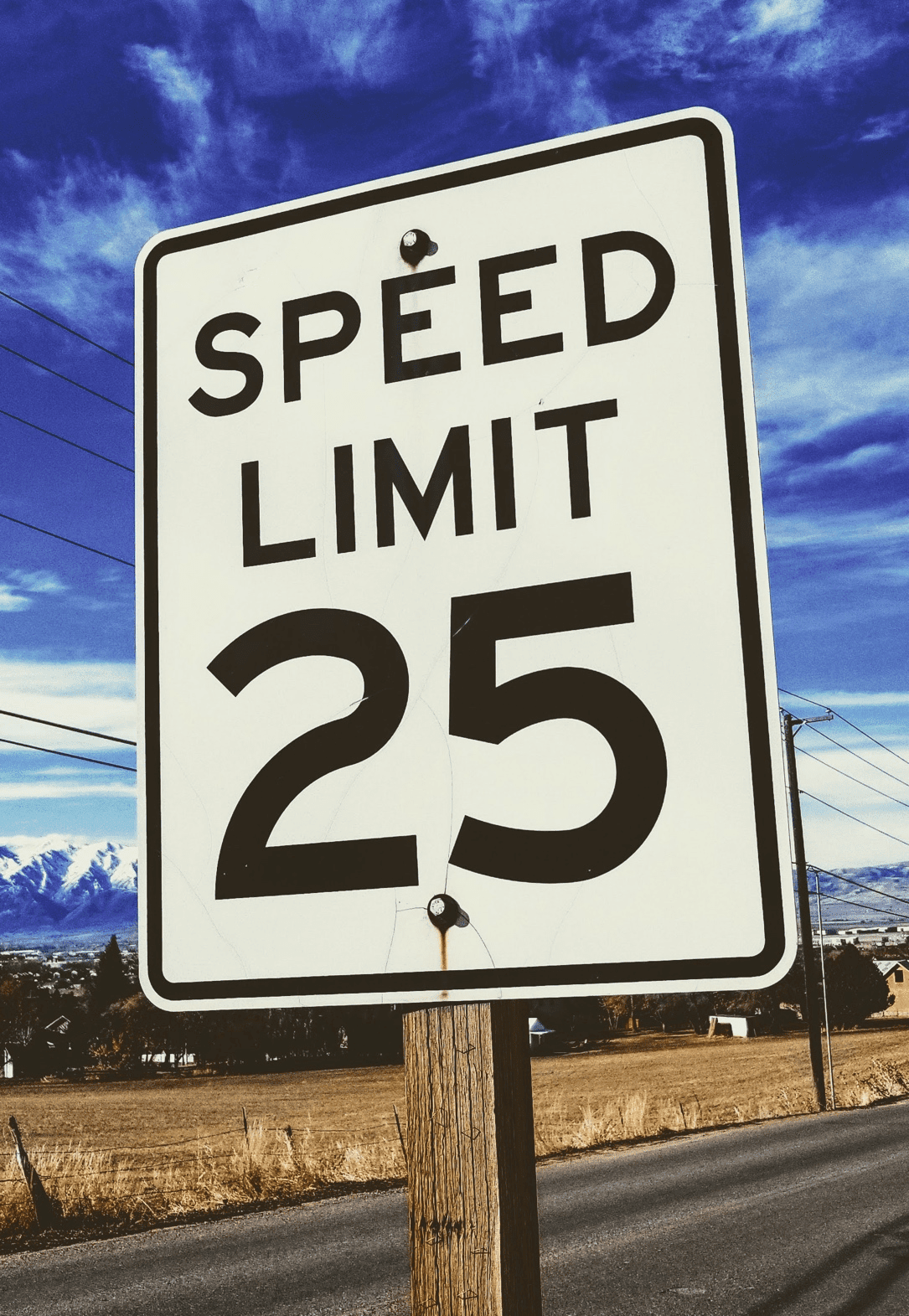 A speed limit sign on the roadside